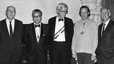 Caltech faculty, with their Nobel Prize medals, from left to right: Carl Anderson, Murray Gell-Mann, Max Delbruck, Richard Feynman, George Beadle. 